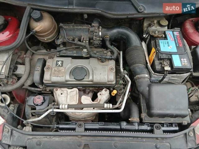 Красный Пежо 206, объемом двигателя 1.4 л и пробегом 231 тыс. км за 3400 $, фото 8 на Automoto.ua