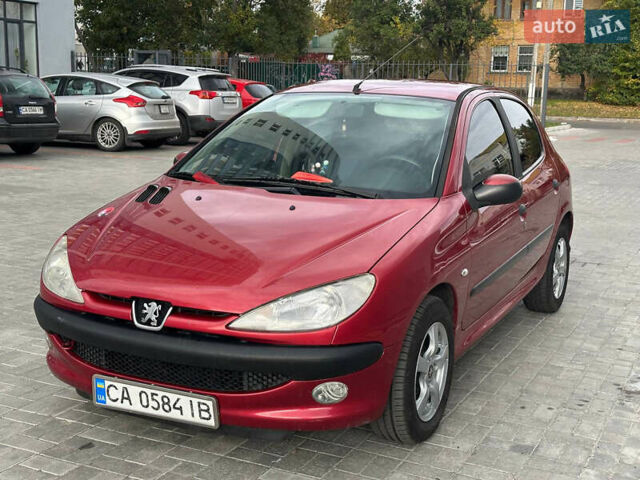 Червоний Пежо 206, об'ємом двигуна 1.59 л та пробігом 195 тис. км за 3800 $, фото 11 на Automoto.ua