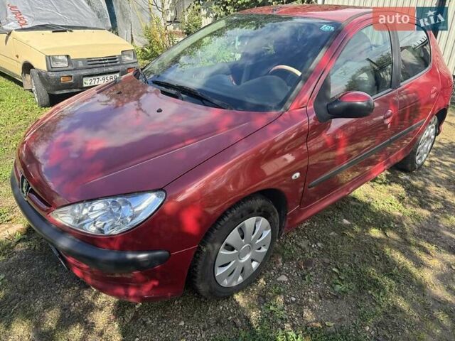 Красный Пежо 206, объемом двигателя 1.36 л и пробегом 133 тыс. км за 4200 $, фото 7 на Automoto.ua