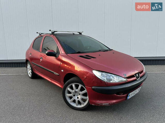 Красный Пежо 206, объемом двигателя 1.4 л и пробегом 263 тыс. км за 2600 $, фото 1 на Automoto.ua