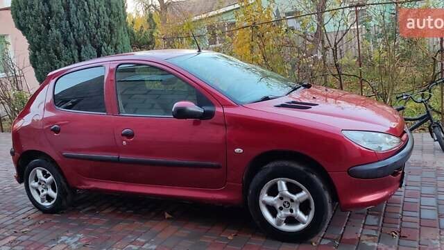 Червоний Пежо 206, об'ємом двигуна 1.4 л та пробігом 204 тис. км за 2850 $, фото 3 на Automoto.ua