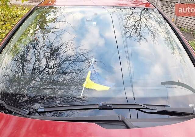 Красный Пежо 206, объемом двигателя 1.4 л и пробегом 199 тыс. км за 3900 $, фото 5 на Automoto.ua