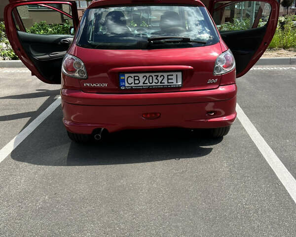 Червоний Пежо 206, об'ємом двигуна 1.36 л та пробігом 268 тис. км за 3500 $, фото 10 на Automoto.ua