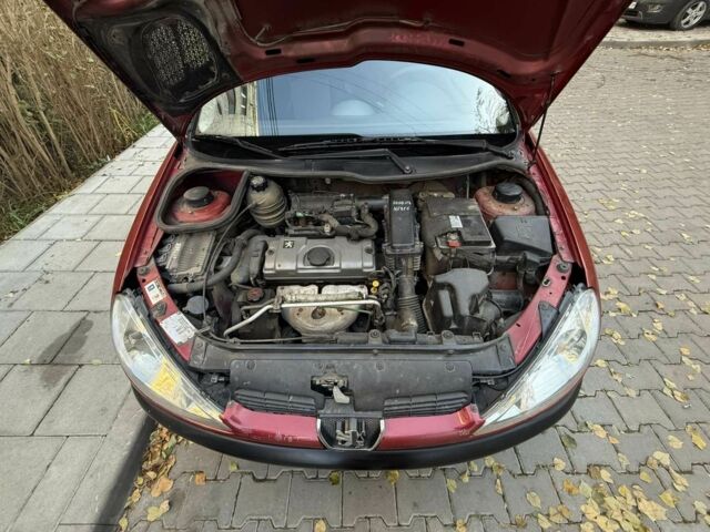 Красный Пежо 206, объемом двигателя 1.4 л и пробегом 171 тыс. км за 3200 $, фото 10 на Automoto.ua