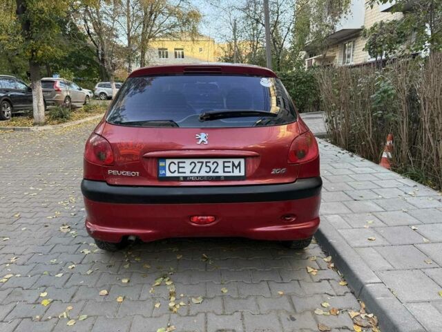 Красный Пежо 206, объемом двигателя 1.4 л и пробегом 171 тыс. км за 3200 $, фото 5 на Automoto.ua