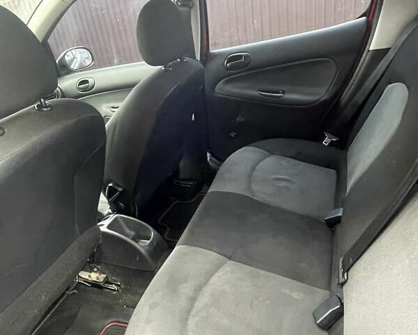 Красный Пежо 206, объемом двигателя 1.36 л и пробегом 181 тыс. км за 3900 $, фото 8 на Automoto.ua