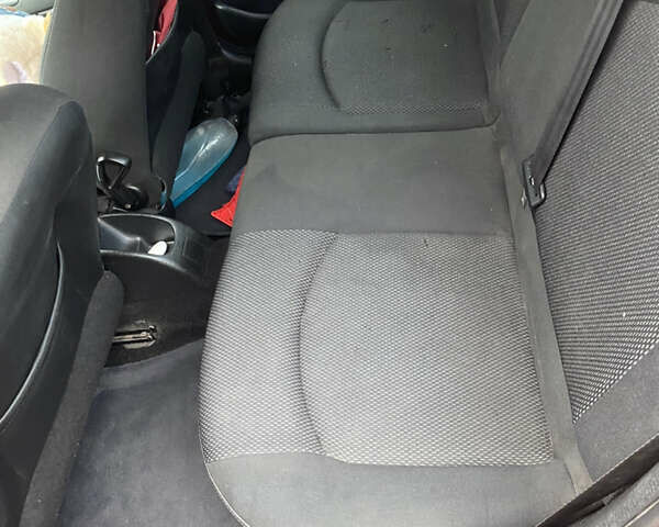 Красный Пежо 206, объемом двигателя 1.59 л и пробегом 269 тыс. км за 3900 $, фото 6 на Automoto.ua