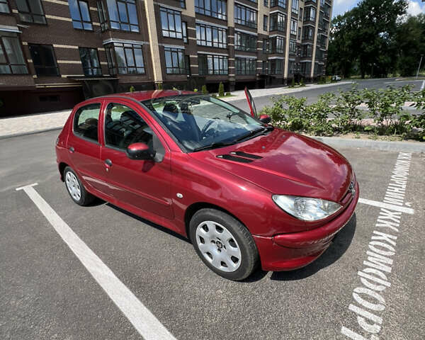 Червоний Пежо 206, об'ємом двигуна 1.36 л та пробігом 268 тис. км за 3500 $, фото 12 на Automoto.ua
