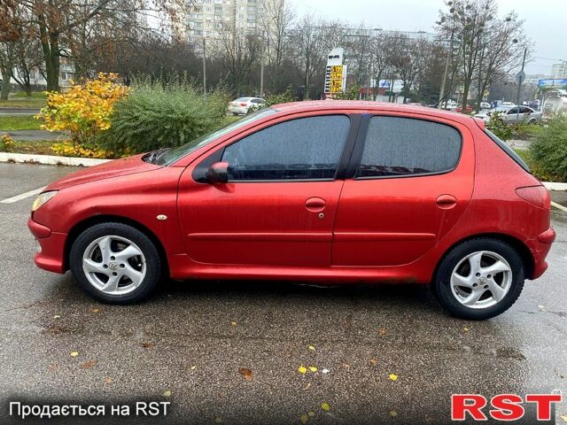 Красный Пежо 206, объемом двигателя 1.6 л и пробегом 269 тыс. км за 3900 $, фото 1 на Automoto.ua