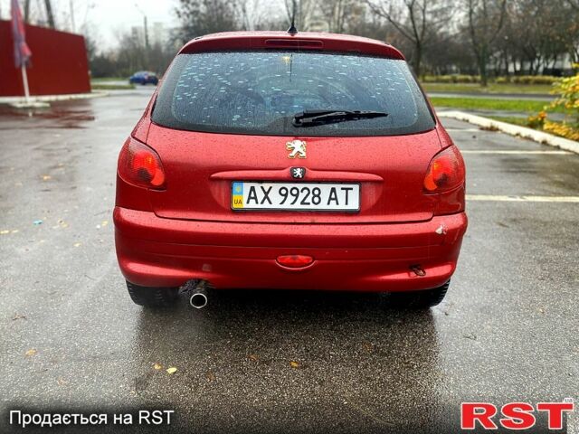 Красный Пежо 206, объемом двигателя 1.6 л и пробегом 269 тыс. км за 3900 $, фото 3 на Automoto.ua