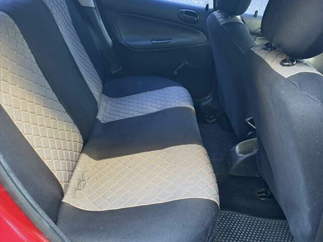 Красный Пежо 206, объемом двигателя 1.4 л и пробегом 171 тыс. км за 3200 $, фото 3 на Automoto.ua