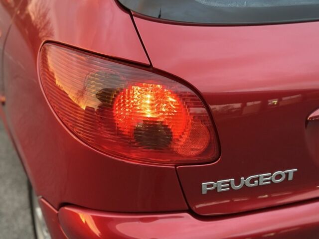 Красный Пежо 206, объемом двигателя 1.4 л и пробегом 119 тыс. км за 4500 $, фото 22 на Automoto.ua