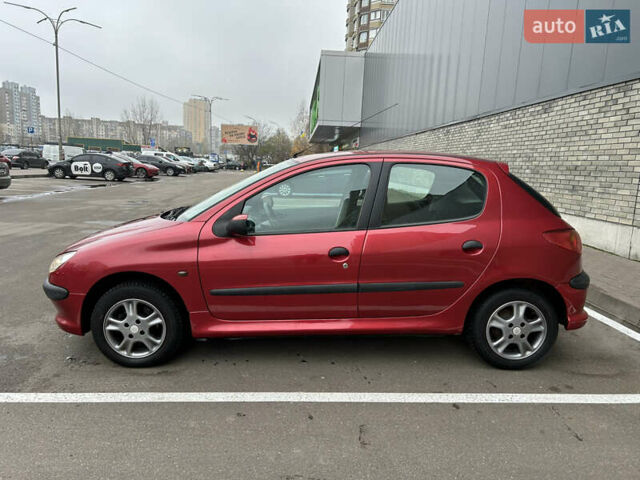 Красный Пежо 206, объемом двигателя 1.4 л и пробегом 76 тыс. км за 5200 $, фото 5 на Automoto.ua