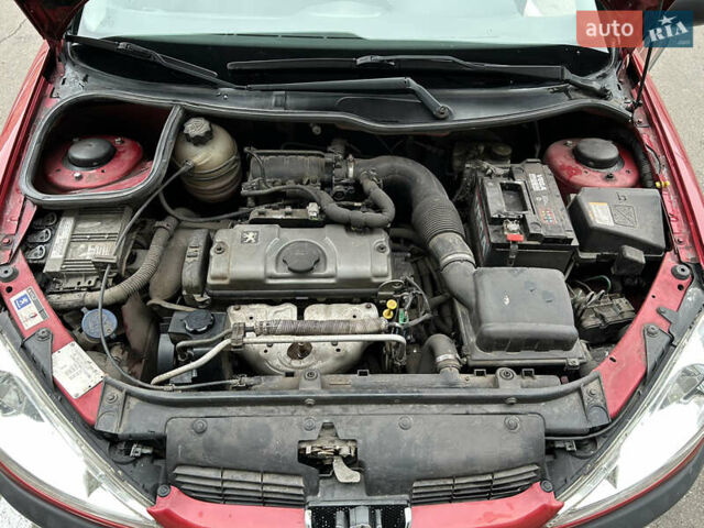 Красный Пежо 206, объемом двигателя 1.4 л и пробегом 76 тыс. км за 5200 $, фото 13 на Automoto.ua