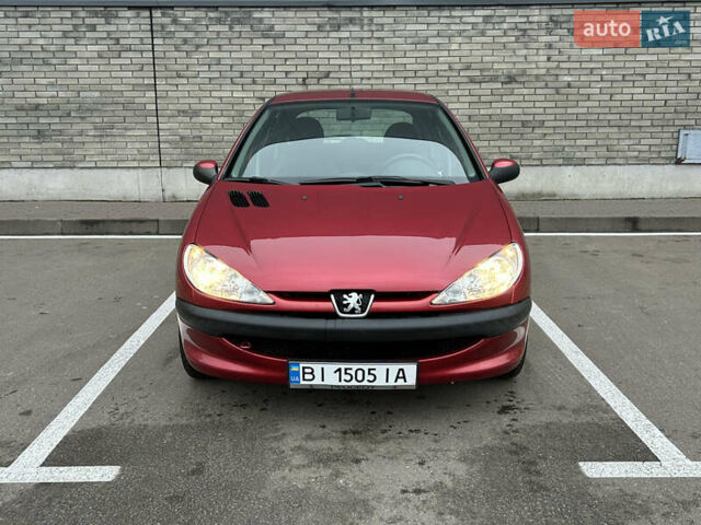 Красный Пежо 206, объемом двигателя 1.4 л и пробегом 76 тыс. км за 5200 $, фото 7 на Automoto.ua
