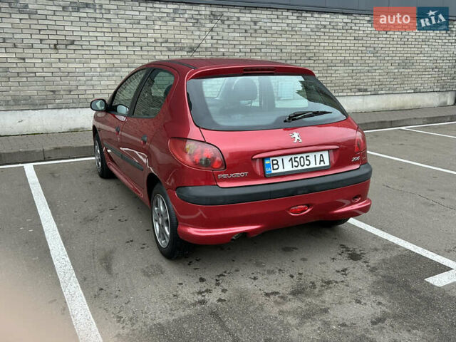Красный Пежо 206, объемом двигателя 1.4 л и пробегом 76 тыс. км за 5200 $, фото 4 на Automoto.ua