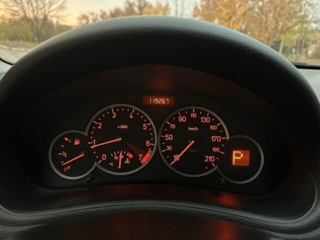 Красный Пежо 206, объемом двигателя 1.4 л и пробегом 119 тыс. км за 4500 $, фото 18 на Automoto.ua