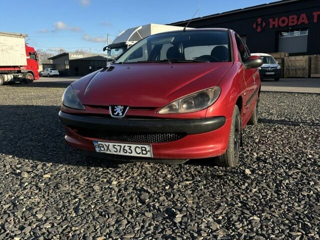 Красный Пежо 206, объемом двигателя 1.4 л и пробегом 165 тыс. км за 2850 $, фото 2 на Automoto.ua