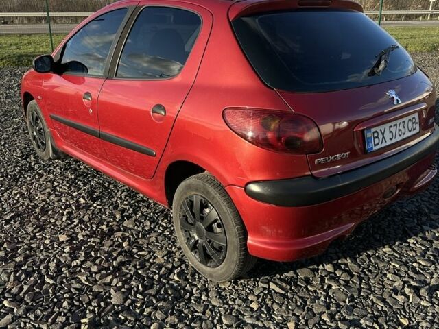 Красный Пежо 206, объемом двигателя 1.4 л и пробегом 165 тыс. км за 2850 $, фото 5 на Automoto.ua