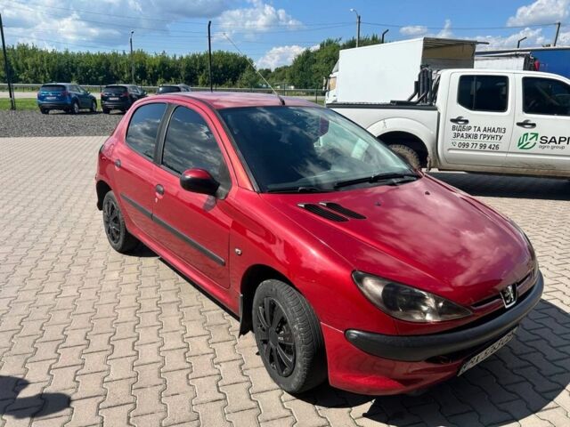 Червоний Пежо 206, об'ємом двигуна 1.4 л та пробігом 175 тис. км за 3219 $, фото 1 на Automoto.ua