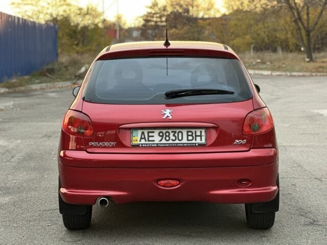 Красный Пежо 206, объемом двигателя 1.4 л и пробегом 119 тыс. км за 4500 $, фото 2 на Automoto.ua