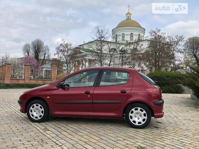 Червоний Пежо 206, об'ємом двигуна 1.4 л та пробігом 156 тис. км за 4200 $, фото 5 на Automoto.ua