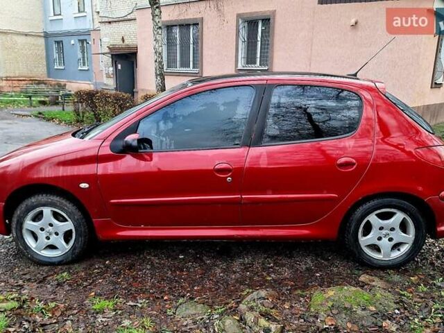 Красный Пежо 206, объемом двигателя 1.36 л и пробегом 226 тыс. км за 3799 $, фото 12 на Automoto.ua