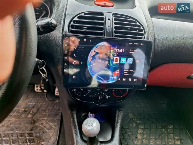 Красный Пежо 206, объемом двигателя 1.36 л и пробегом 226 тыс. км за 3799 $, фото 35 на Automoto.ua