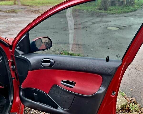 Красный Пежо 206, объемом двигателя 1.36 л и пробегом 226 тыс. км за 3799 $, фото 28 на Automoto.ua