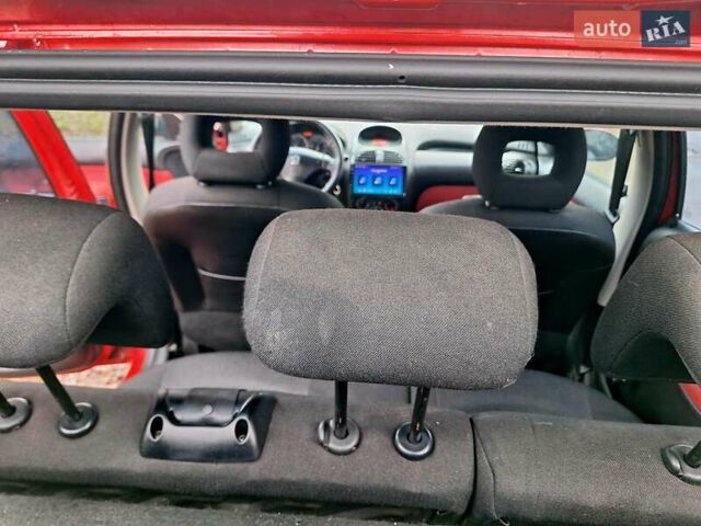 Красный Пежо 206, объемом двигателя 1.36 л и пробегом 226 тыс. км за 3799 $, фото 39 на Automoto.ua