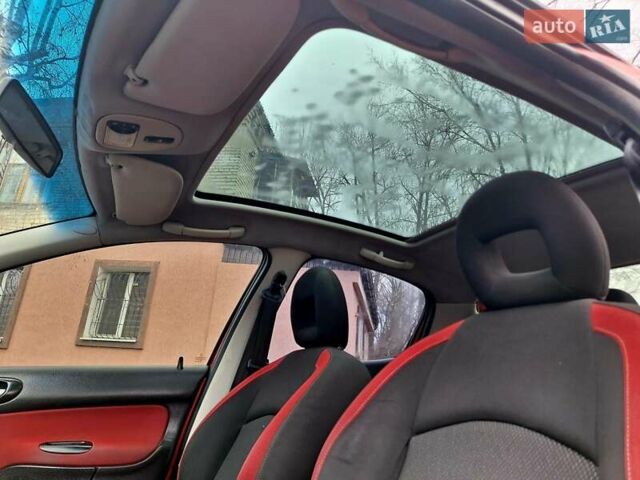 Красный Пежо 206, объемом двигателя 1.36 л и пробегом 226 тыс. км за 3799 $, фото 42 на Automoto.ua