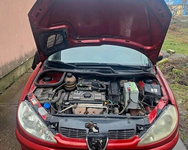 Красный Пежо 206, объемом двигателя 1.36 л и пробегом 226 тыс. км за 3799 $, фото 48 на Automoto.ua