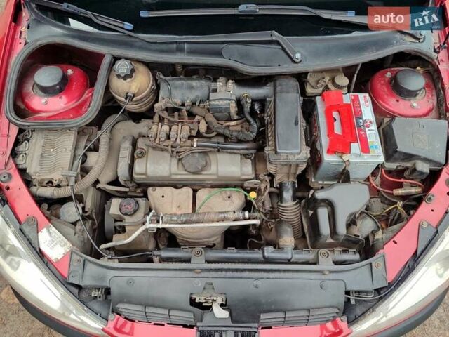 Червоний Пежо 206, об'ємом двигуна 1.36 л та пробігом 230 тис. км за 3800 $, фото 18 на Automoto.ua