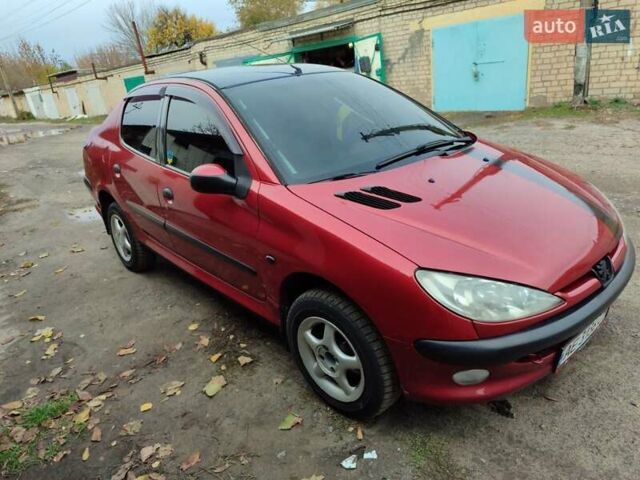 Червоний Пежо 206, об'ємом двигуна 1.36 л та пробігом 230 тис. км за 3800 $, фото 7 на Automoto.ua