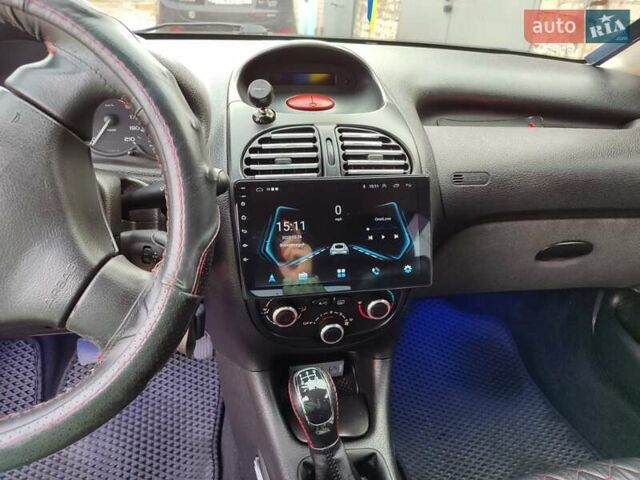 Червоний Пежо 206, об'ємом двигуна 1.36 л та пробігом 230 тис. км за 3800 $, фото 14 на Automoto.ua