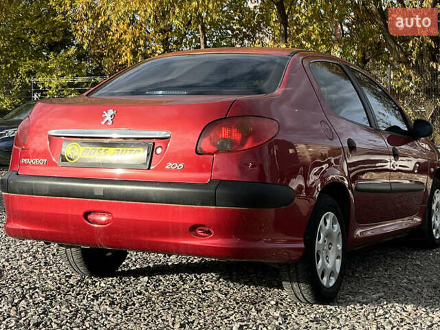 Красный Пежо 206, объемом двигателя 1.4 л и пробегом 139 тыс. км за 3999 $, фото 5 на Automoto.ua