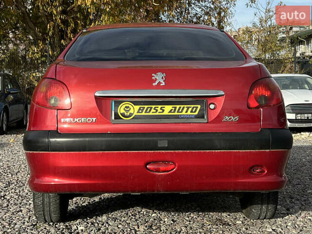 Красный Пежо 206, объемом двигателя 1.4 л и пробегом 139 тыс. км за 3999 $, фото 4 на Automoto.ua