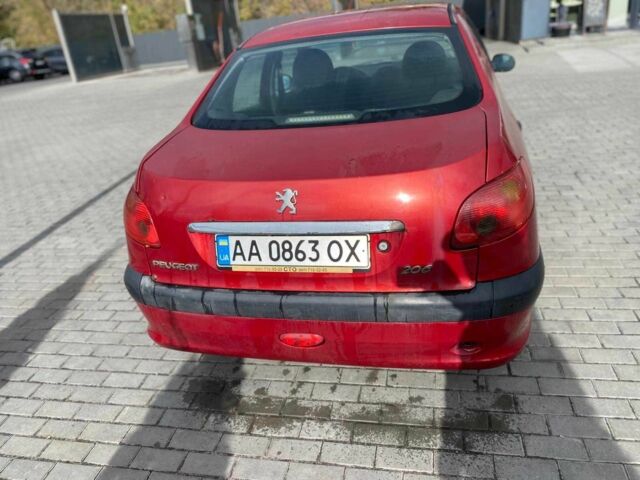 Красный Пежо 206, объемом двигателя 1.4 л и пробегом 170 тыс. км за 2800 $, фото 4 на Automoto.ua