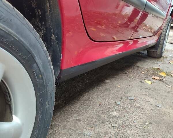 Червоний Пежо 206, об'ємом двигуна 1.36 л та пробігом 230 тис. км за 3800 $, фото 9 на Automoto.ua