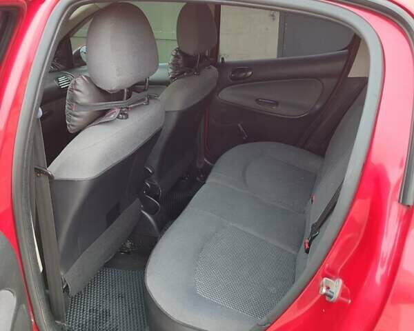 Червоний Пежо 206, об'ємом двигуна 1.36 л та пробігом 230 тис. км за 3800 $, фото 15 на Automoto.ua