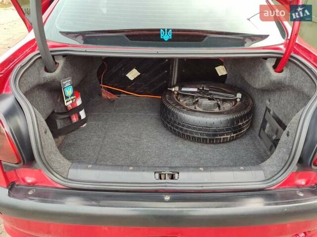 Червоний Пежо 206, об'ємом двигуна 1.36 л та пробігом 230 тис. км за 3800 $, фото 3 на Automoto.ua