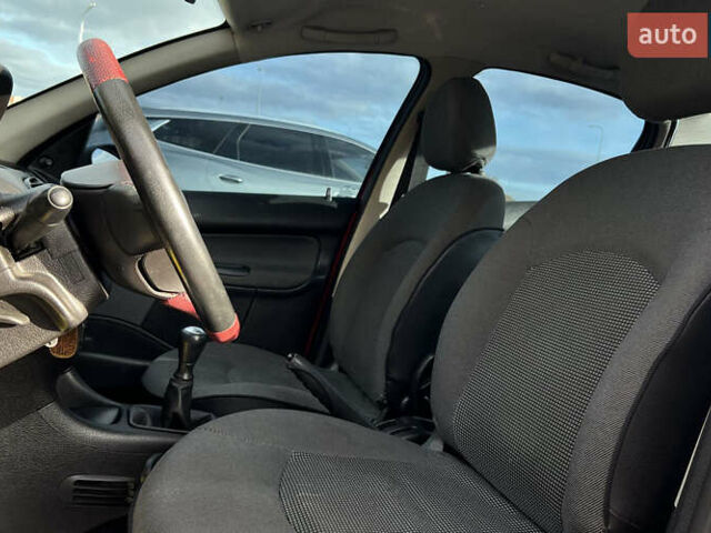 Червоний Пежо 206, об'ємом двигуна 1.4 л та пробігом 139 тис. км за 3999 $, фото 13 на Automoto.ua