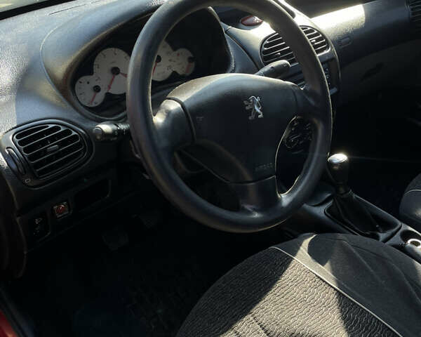 Пежо 206 2008 в Одессе на Automoto.ua Красный Пежо 206, объемом двигателя 1.36 л и пробегом 280 тыс. км за 3500 $, фото 12 на Automoto.ua