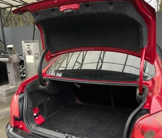 Красный Пежо 206, объемом двигателя 1.4 л и пробегом 133 тыс. км за 3500 $, фото 7 на Automoto.ua