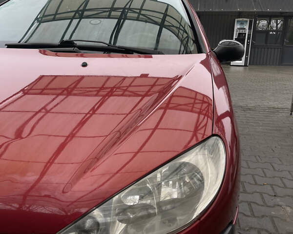 Красный Пежо 206, объемом двигателя 1.36 л и пробегом 133 тыс. км за 3800 $, фото 2 на Automoto.ua