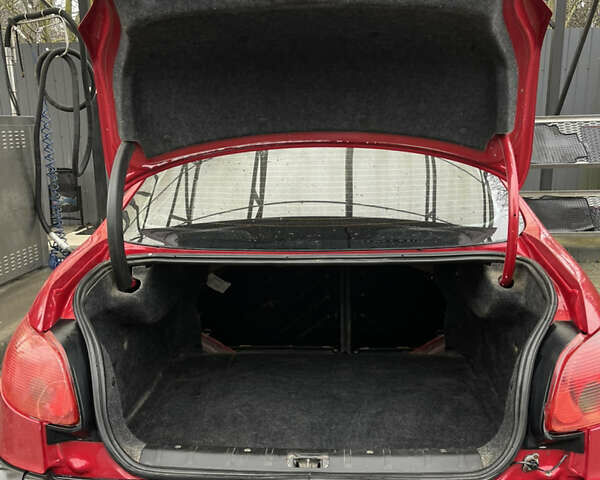 Красный Пежо 206, объемом двигателя 1.36 л и пробегом 133 тыс. км за 3800 $, фото 19 на Automoto.ua