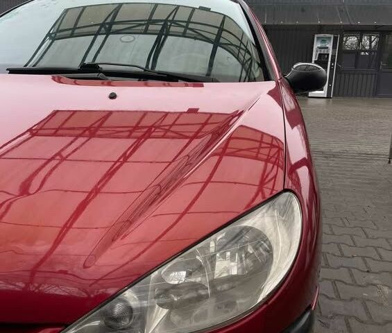 Красный Пежо 206, объемом двигателя 1.4 л и пробегом 133 тыс. км за 3500 $, фото 5 на Automoto.ua