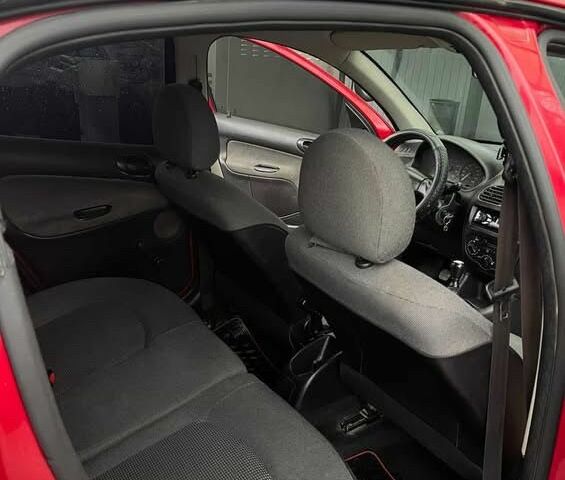 Красный Пежо 206, объемом двигателя 1.4 л и пробегом 133 тыс. км за 3500 $, фото 14 на Automoto.ua