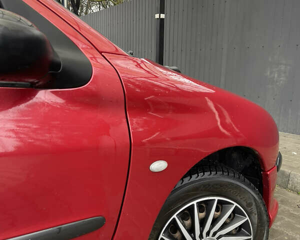 Красный Пежо 206, объемом двигателя 1.36 л и пробегом 133 тыс. км за 3800 $, фото 8 на Automoto.ua