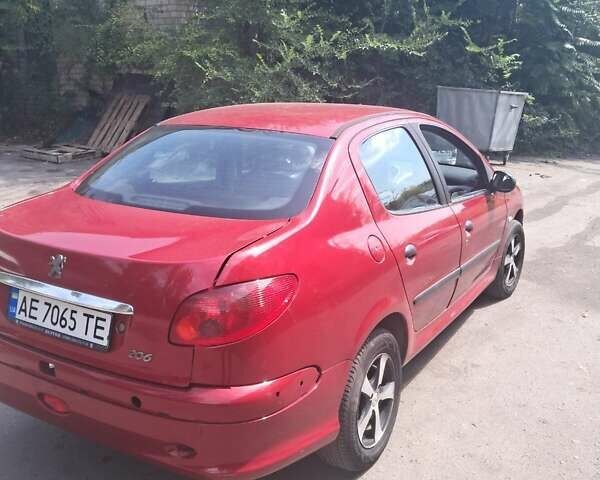 Красный Пежо 206, объемом двигателя 1.36 л и пробегом 118 тыс. км за 3500 $, фото 2 на Automoto.ua
